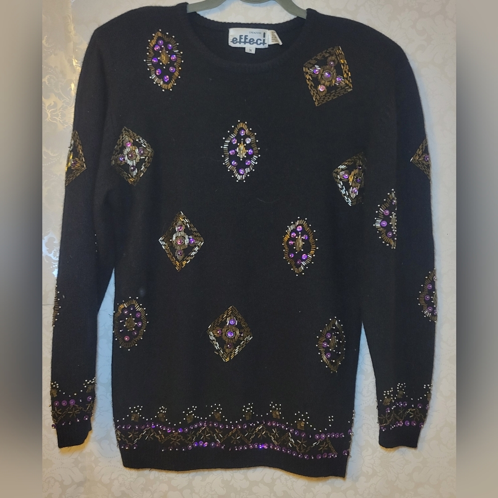 Elegant Black Sweater with Purple and Gold Accents